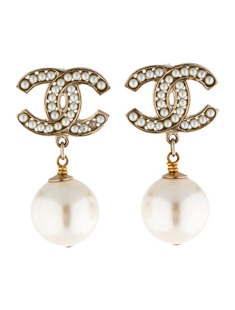 chanel white flower pearl cc piercing earrings|Chanel pearl drop earrings price.